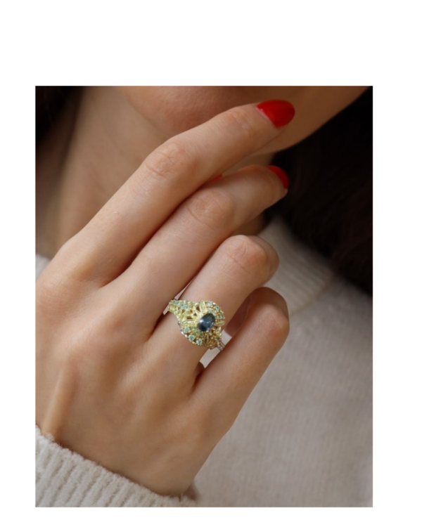 Ring, Artificial golden ring with white green diamond